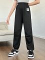SHEIN Kids SUNSHNE Tween Girls' Knitted Solid-Colored Jogger Sweatpants With Patch Detail, Loose Fit And Elastic Cuffs
