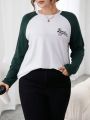 SHEIN Essnce Plus Size Color Block Raglan Sleeve Letter Print T-Shirt