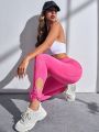 SHEIN Yoga Elegant Cut Out Hem Wide Waistband Sports Leggings With Phone Pocket