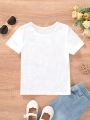 SHEIN Kids EVRYDAY Toddler Girls' Casual Round Neck Short Sleeve Slim Fit T-Shirt With Giraffe Pattern For Summer