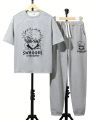 SHEIN Teenage Boys' Casual, Comfortable Short-Sleeved Top And Jogger Pants Set With Comic Character Design