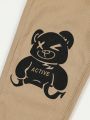 Boys' Fashionable Bear Slogan Printed Cut-out Ripped Straight Leg Jeans For Street Style