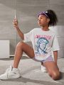 SHEIN Kids Y2Kool Girls Slogan & Figure Graphic Drop Shoulder Tee