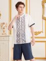 SHEIN Teen Boy Casual Geometric Printed Short Sleeve Shirt With Solid Color Shorts Set
