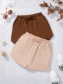 SHEIN Kids SUNSHNE 2pcs/set Teenage Girls' Loose Fit Knitted Solid Color Casual Shorts For Vacation