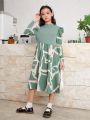 SHEIN Tween Girls' Two-In-One Geometric Floral Spliced Stand Collar Long Sleeve Maxi Casual Dress With Leg-Of-Mutton Sleeves