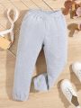 SHEIN Kids QTFun Young Girl Asymmetrical Waist Sweatpants