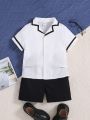 SHEIN Kids Academe Young Boy's Preppy Style Turn-Down Collar Short Sleeve Shirt And Shorts Set