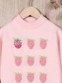 Young Girl Strawberry Pattern Sweater