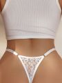 Floral Lace Cut Out Thong