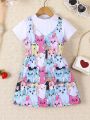 SHEIN Kids QTFun Girls Solid Color Short-Sleeved T-Shirt And All-Over Cartoon Print Suspender Dress Two-Piece Set