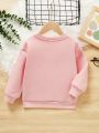 Young Girl Cartoon Graphic Drop Shoulder Sweatshirt