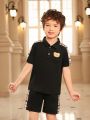 SHEIN Kids Academe Toddler Boys' Cute Bear Applique Plaid Polo Shirt And Shorts Set