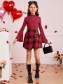 SHEIN Kids FANZEY Girls' Knit Solid Color Stand Collar Top And Knit Plaid Skirt Set