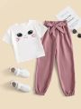 SHEIN Kids QTFun Girls Cartoon Graphic Tee & Paper Bag Waist Belted Pants