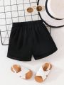 SHEIN Kids FANZEY Young Girls' Cute & Casual Basic Button Up Commuter Shorts