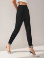 K by AKW High-Waisted Black Denim Jeans With Optional Houndstooth Cuff