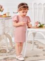 SHEIN Baby Girls' Casual Bubble Short Sleeve Slim Fit Solid Color Dress