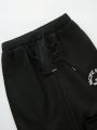 Women's Black Sweatpants With Letter Print And Elastic Cuffs