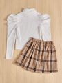 SHEIN Kids Cooltwn Big Girls' Knitted Solid Color High Neck Long Sleeve Top With Plaid Skirt