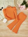 SHEIN Young Girl Button Decor Stand Collar Leg-Of-Mutton Sleeve Ribbed Knit T-Shirt And Flared Pants Set