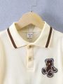 SHEIN Kids Academe Young Boy Bear Patch Short Sleeve Polo Shirt And Shorts Set