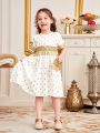 SHEIN Kids Nujoom Little Girls' Gold Foil Print Woven Tape Trim Patchwork Tassel Decoration Dress