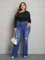 Plus Size Distressed Flare Jeans With Hole Details