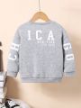 SHEIN Kids EVRYDAY Little Girls' Long Sleeve Grey Pullover With Girl Printed Wide Sleeves & Crew Neck For Spring & Autumn