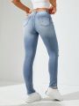 Women's Distressed Skinny Jeans