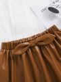 SHEIN Tween Girl'S Solid Color Pu Leather Flared Skirt