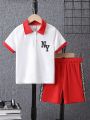 SHEIN Kids FANZEY Toddler Boys' Casual Patchwork Polo Shirt With Printed Woven Tape Decoration And Shorts Set For Outdoor Summer