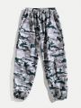 SHEIN Kids HYPEME Tween Boys' Stylish Camouflage Print Joggers With Pockets And Drawstring Waist, Loose Fit