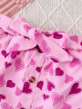 SHEIN Kids QTFun Girls' New Love Heart Print Round Neck Long Sleeve Top With Elastic Waist A-line Skirt Set