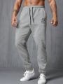 Men Letter Graphic Drawstring Waist Sweatpants