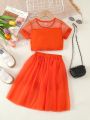 SHEIN Kids EVRYDAY Toddler Girls' Casual Orange Letter Printed Sheer Sleeve T-Shirt And Mesh Skirt 2pcs/Set