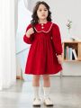 SHEIN Kids Nujoom Young Girl Contrast Binding Button Front Lantern Sleeve Dress