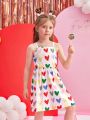 SHEIN Kids QTFun Young Girl New Sweetheart Print Spaghetti Strap Loose Fit A-Line Dress