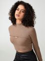 Manon Gautier Mock Neck Cut Out Front Crop Top