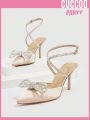 Cuccoo Party Collection Rhinestone & Bow Decor Satin Point Toe Heeled Ankle Strap Pumps