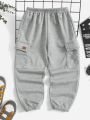 SHEIN Toddler Boys Flap Pocket Sweatpants