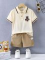 SHEIN Kids Academe Young Boy Bear Patch Short Sleeve Polo Shirt And Shorts Set