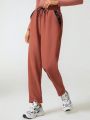 Jenny Gyn Drawstring Waist Slant Pocket Pants