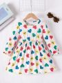 SHEIN Kids EVRYDAY Little Girls' Lovely Expression & Heart Pattern Simple Long Sleeve Dress