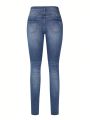 Women's Skinny Ripped Jeans With Water Washing Effect