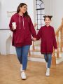 SHEIN LUNE Plus Size Solid Color Hooded Sweatshirt With Pocket And Drawstring