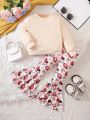 SHEIN Kids SUNSHNE Little Girls' Knitted Round Neck Loose Solid Color Sweatshirt And Knitted Floral Flare Pants Set