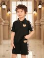 SHEIN Kids Academe Toddler Boys' Cute Bear Applique Plaid Polo Shirt And Shorts Set