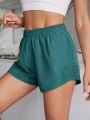 Eyelet Cut Out Solid Sports Shorts