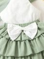 SHEIN Kids CHARMNG Toddler Girls Eyelet Embroidery Halter Top & Bow Front Layer Hem Skirt